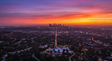 Fototapeta premium Breathtaking sunset over Los Angeles with glowing streets