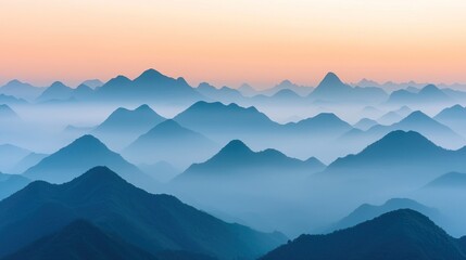Misty Mountain Range at Dawn with Soft Hues and Gentle Light Over the Landscape