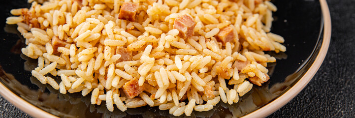Rice with ham meat main course delicious fresh delicious gourmet food background on the table rustic food top view copy space