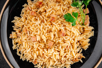 Rice with ham meat main course delicious fresh delicious gourmet food background on the table rustic food top view copy space