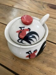 Rooster Condiment Bowl on Wooden Table