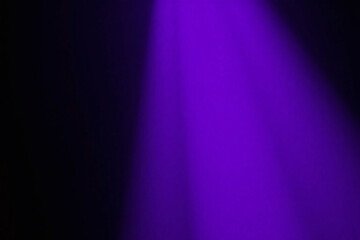 Fototapeta premium purple light shines brightly in the dark