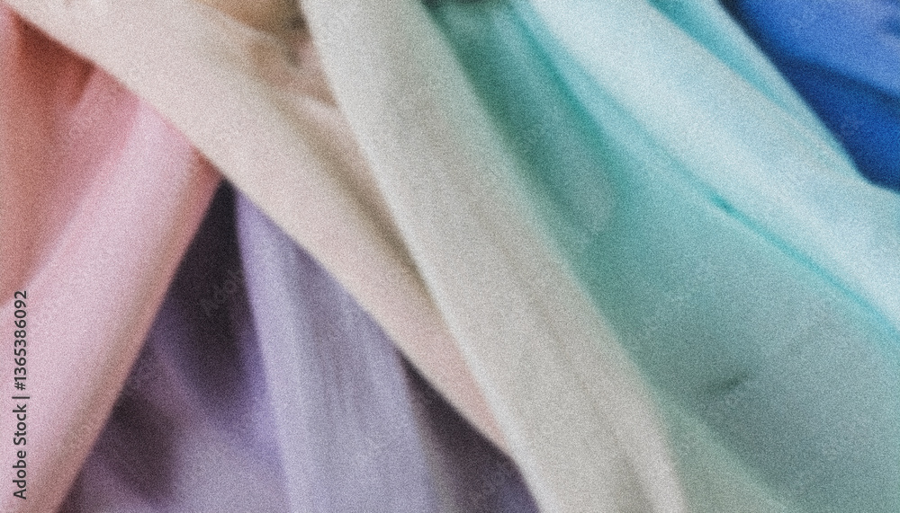 Poster pastel colored fabric with grainy texture creating an abstract background