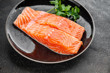 Salmon red fish organic seafood tasty fresh delicious gourmet food background on table rustic food top view copy space keto and paleo diet vegetarian food pescetarian diet