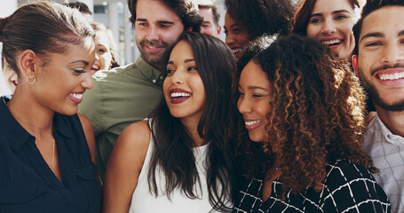 Friends, laughing and business people hug in office together for love, support and team building. Smile, happy and group of employees in company workplace for bonding, diversity and collaboration