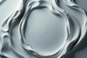 Smooth and malleable grey modelling clay surface for creative backgrounds or textures,  pottery,  malleable