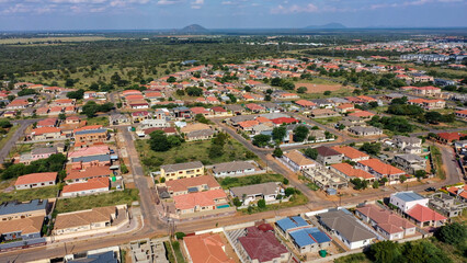 Obraz premium aerial view of residential area Gaborone Botswana daytime, vegetation area in the background