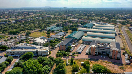 aerial view of industrial area Gaborone Botswana daytime, residential area in the background