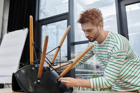 Packing furniture while preparing for a modern office move in a vibrant workspace