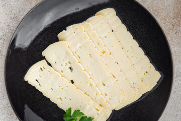 Cheese slices tartiflette soft cheese tasty fresh delicious gourmet food background on the table...