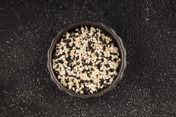 Sesame spice mix white and black tasty fresh gourmet food background on table rustic food top view copy space keto and paleo diet vegetarian and vegan food