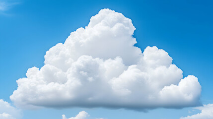 A single, large cumulus cloud floats against a vibrant blue sky