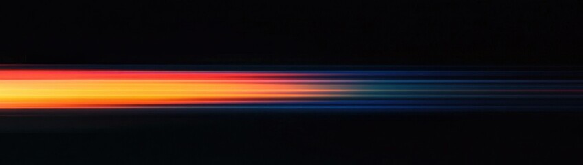 Naklejka premium A long horizontal streak of light with an orange and blue gradient on a black background.