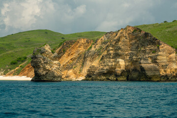 Fototapeta premium View of a steep sea cliff on an island in Indonesia