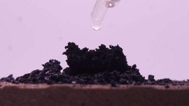Burning Potassium permanganate and glycerin. When glycerin is added to potassium permanganate, a rapid reaction occurs, producing a purple flame and white smoke-like vapor