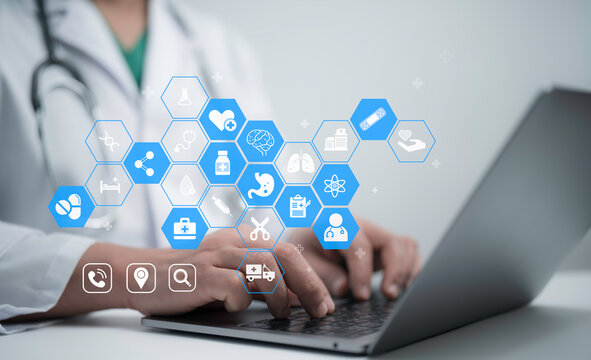 Futuristic medical interface showing healthcare icons, doctor hands on keyboard and digital connections representing telemedicine and smart health services - Powered by Adobe