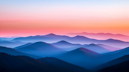 Fototapeta premium Pink And Orange Sunset Over Blue Misty Mountains