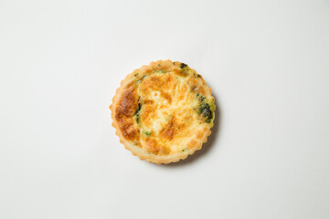 Cheese and Spinach Tartlet on a White Background