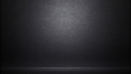 a dark gray concrete wall illuminated by a dim spotlight. The wall has a slightly rough texture and appears to be in a studio setting