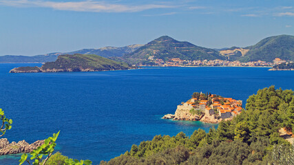 Fototapeta premium Sveti Stefan Islet and Resort in Adriatic Sea Montenegro Coast Panorama Sunny Spring Day