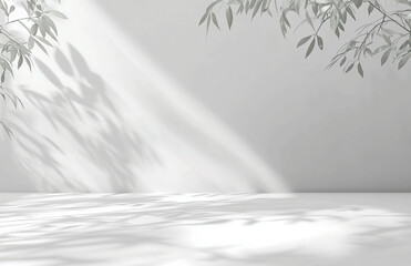 White room with leaf shadows and sunlight creating a serene and bright minimalist background scene