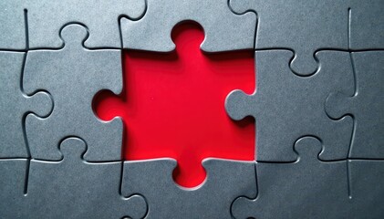 Gray jigsaw puzzle, vibrant red background visible through missing piece, vibrant, crucial element