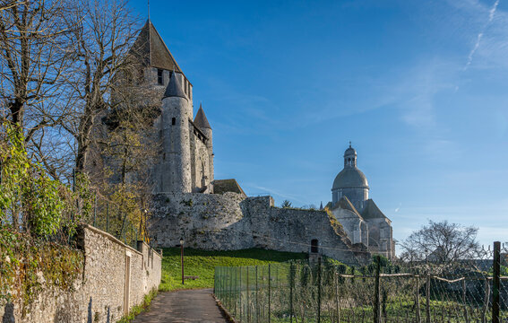 Provins, France - 11 30 2024: Panoramic view of the Caesar Tower and Saint-Quiriace collegiate church in the Medieval City .