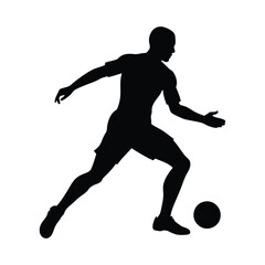 Silhouette of a football player in action running and kicking a ball in a competitive soccer game
