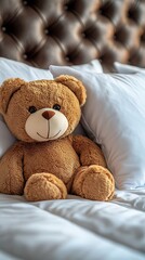 Teddy Bear on White Bed.