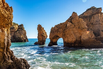 Ponta da Piedade is a unique rock formation with famous grottos in the ocean at Lagos, Algrave,...