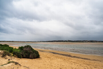 Wooden walkways lead to water in famous beach of Tres Irmaos in Alvor, Portimao, Algarve, Portugal, Europe