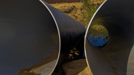
The waste is discharged into the lake through pipes. View from the factory pipe. Ecological issue....