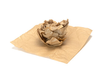Crumpled junk brown recycled paper ball