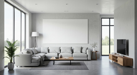 Fototapeta premium Serene modern living room, featuring a spacious grey sectional sofa centered beneath a large blank canvas, bathed in soft natural light streaming through expansive windows.