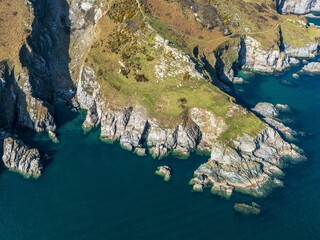 An aeriel drone view of cliffs and sea in England, Devon