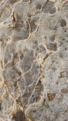 Texture of the surface of the stone. Abstract background for design. Selective focus