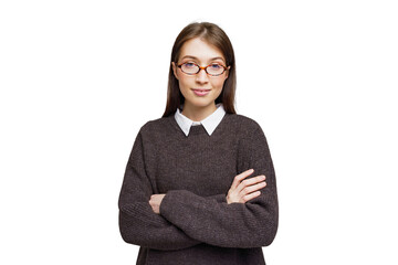 Young woman with glasses standing confidently, wearing a cozy sweater against a plain background