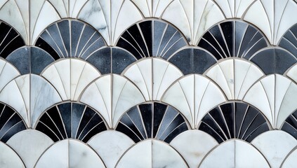 Elegant, symmetrical mosaic tile design in black and white.  Features fan-shaped,  fishscale pattern