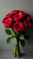 Obraz premium Deep red roses tightly bound, classic bouquet shape, photography, still life