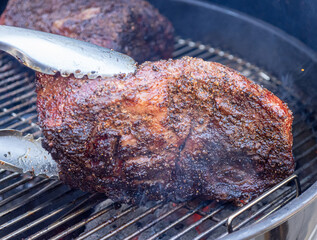 Prime beef picanha steak being cooked on a grill