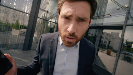 Moving shot Caucasian businessman drunk bad feeling dizzy tired stressed confused in city near...