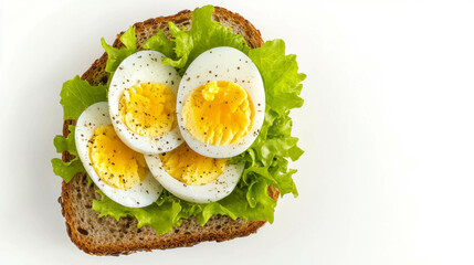 Delicious boiled egg salad sandwich on whole grain bread with fresh lettuce