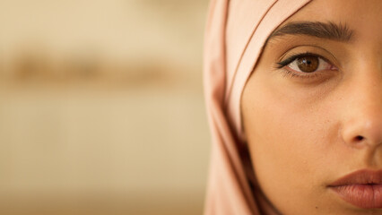 Close up health problem pensive peaceful half female face at home Muslim woman in hijab Islamic...