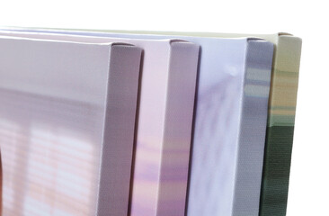 Canvas with different printed photos isolated on white