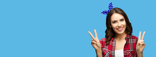 Image of cute beautiful brunette woman point two fingers success, victory peace hand v- sign...