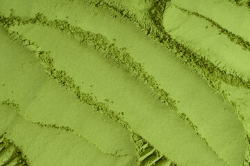 Matcha tea, matcha powder as a background.