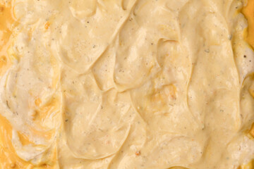 Yellow sauce splashes as a background.