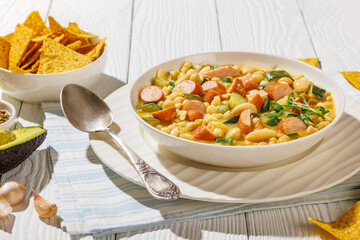 white bean chickpea chili with sausages, zucchini