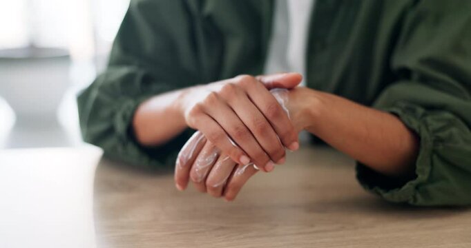 Home, hands and woman with skincare, cream and dermatology with beauty, cosmetics and treatment. Closeup, apartment and person with lotion, moisturiser and creme with healthy skin and eczema