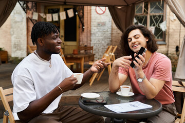 Loving couple enjoys delightful coffee date at cozy cafe under a charming canopy